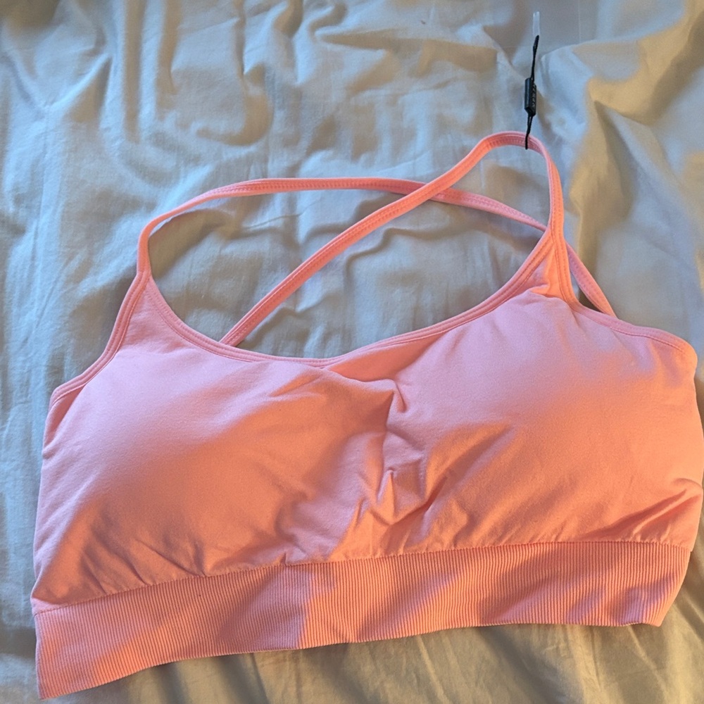 NVGTN Light Pink Strappy Sports Bra